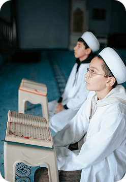 Students studying the Quran